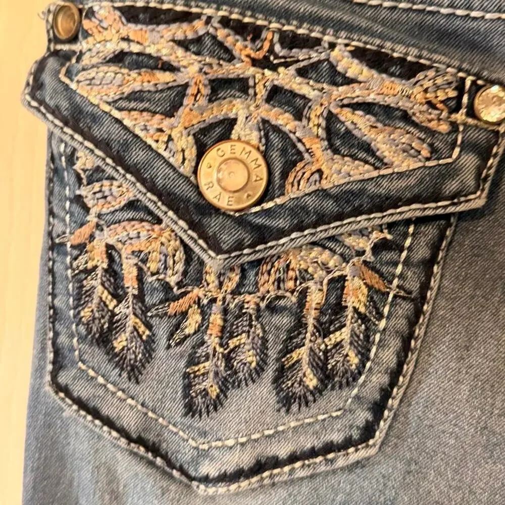 Gemma Rae Y2k blue ripped bootcut with stitch and rhinestone back pocket- 3/26
